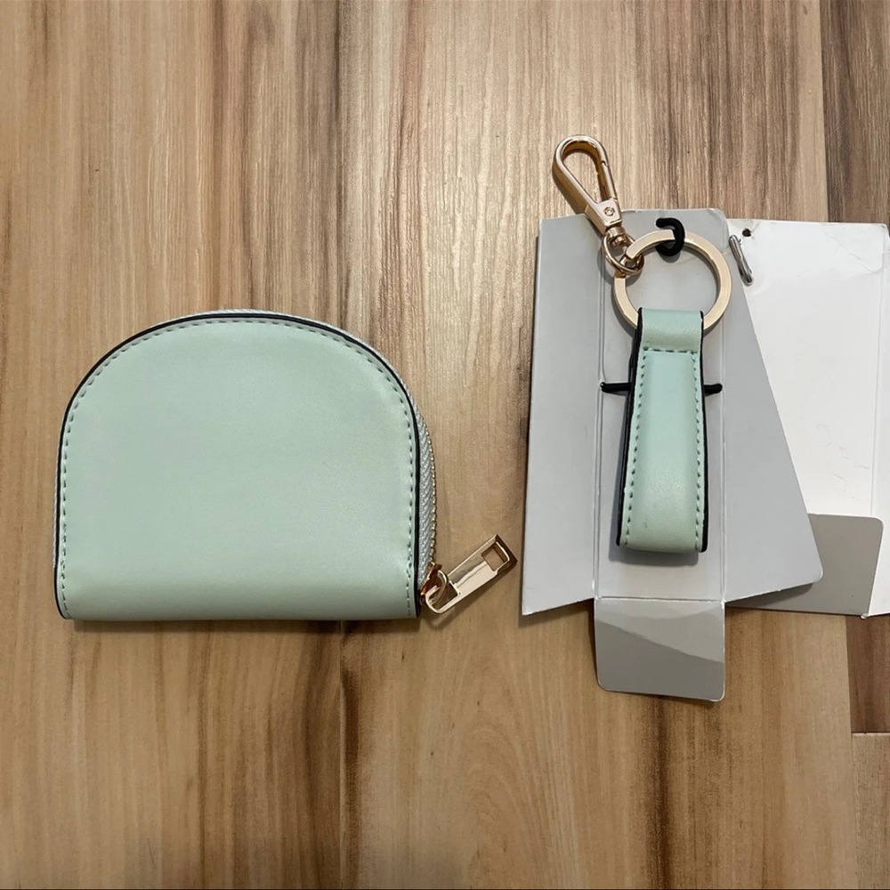 A new day coin purse and keychain set